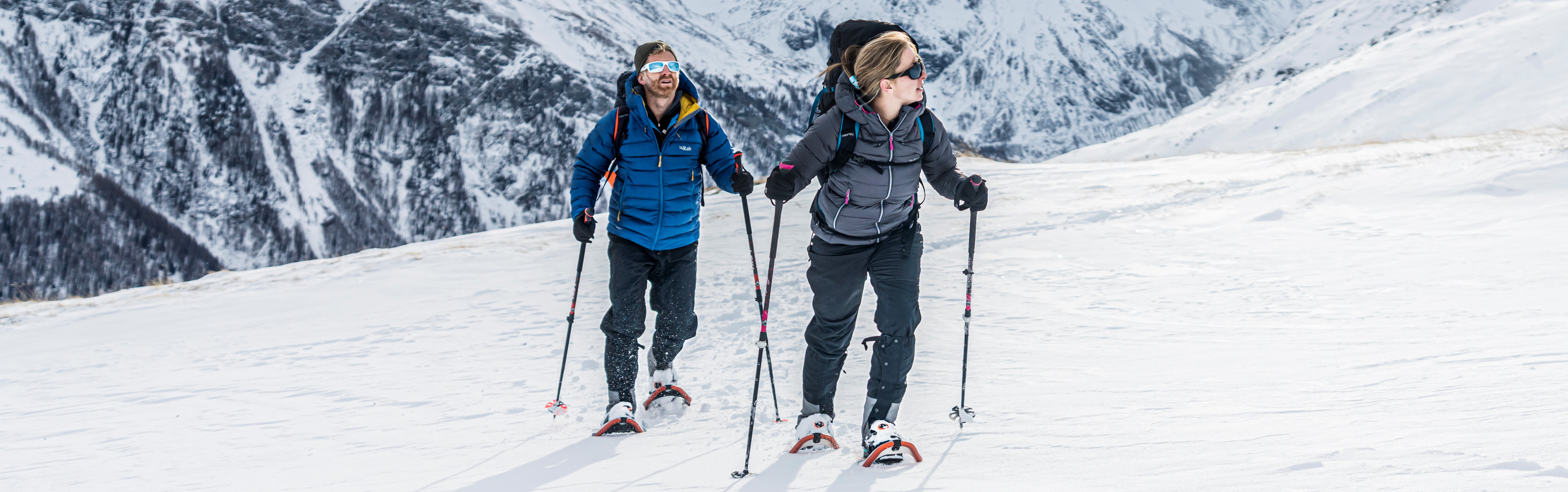 Mountain skiers scaling back up in their Nikwax treated waterproof and sweatproof layers.